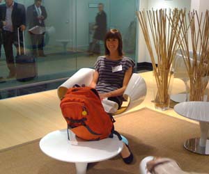Lorene at Neocon Lorene, our library intern for Summer 2010, finds space for herself and her bright orange backpack.
