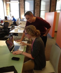 photo Albert works with Jessica on a rendering